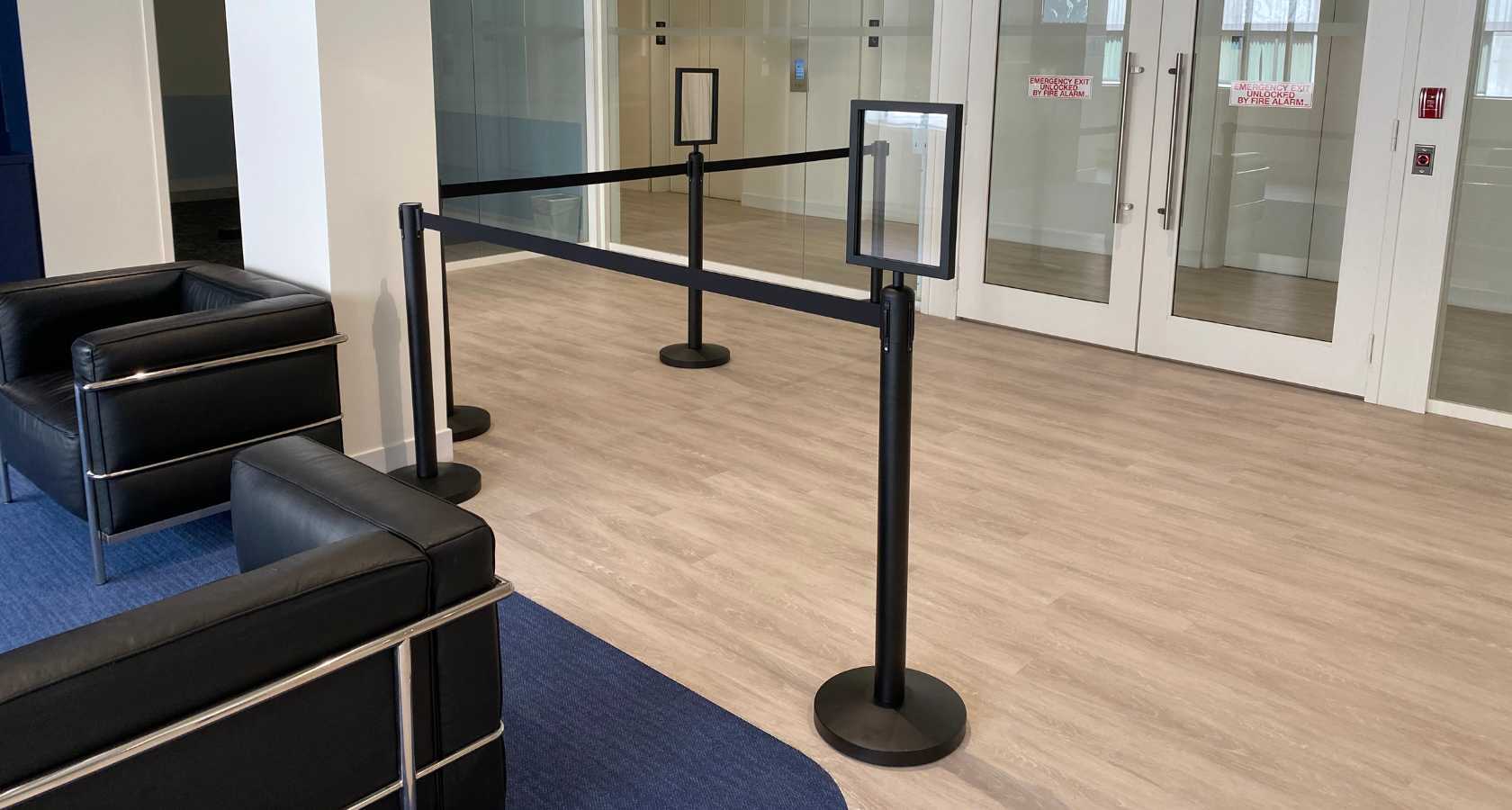 Stanchion sign holders and queue signage